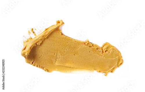 Peanut butter isolated on white background, top view