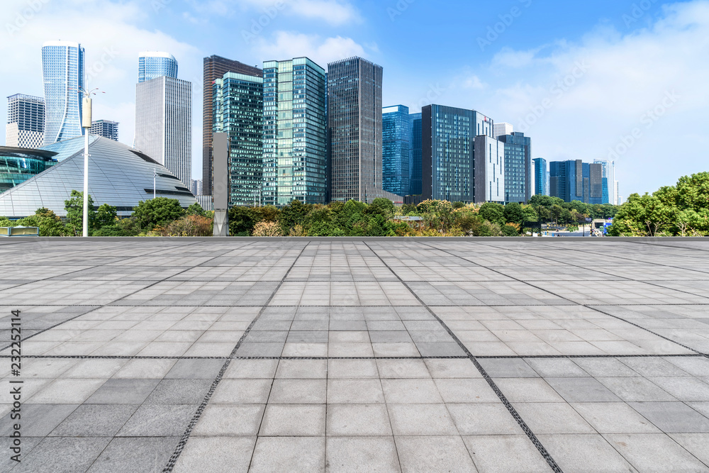Blue sky, empty marble floor and skyline of Hangzhou urban architecture.