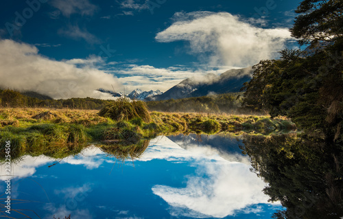 Mirror Lakes with reflection of Earl Mountains, Fjordland National Park, Millford, New Zealand