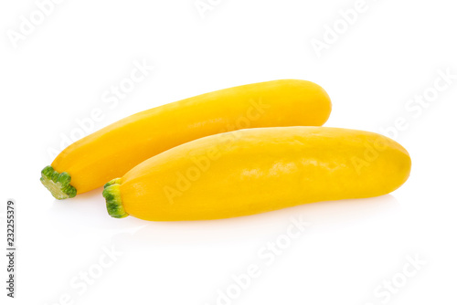unpeeled fresh yellow zucchini on white background