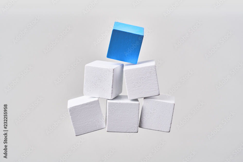 Abstract floating wooden pyramid on white background Abstract floating wooden pyramid on white background