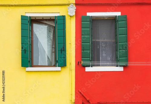 Venice  Burano  colorful walls of houses and two windows
