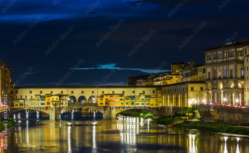 View of Gold (Ponte Vecchio) Bridge in Florence on a sunset