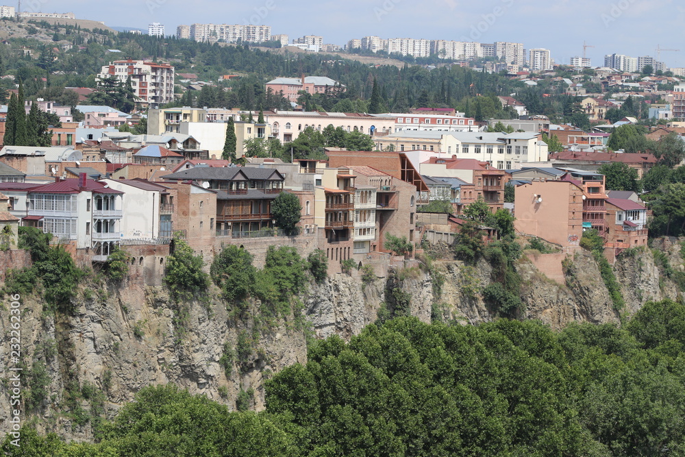 Buildings on rock in Tbilisi city