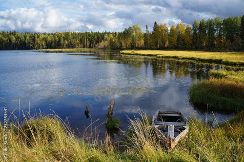 Beautiful forest lake at the time of Golden autumn. Russia, Karelia