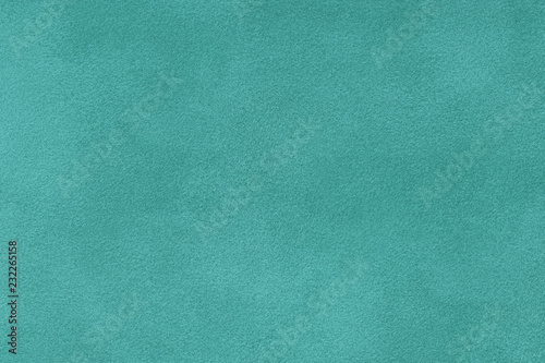 Konstfotografi turquoise matt suede fabric closeup. Velvet texture.