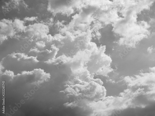 Grey sky with white and black cloud