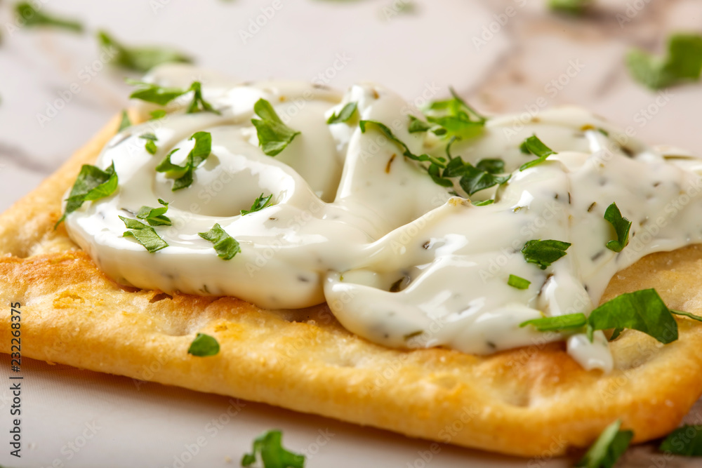 Salted biscuit with cheese cream and herbs Salted biscuit with cheese cream and herbs