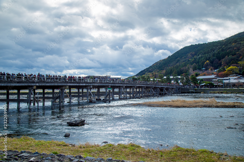 Togetsukyo Bridge in Arashiyama, Kyoto Prefecture, Japan during Koyo Autumn Leaves Festival 2018