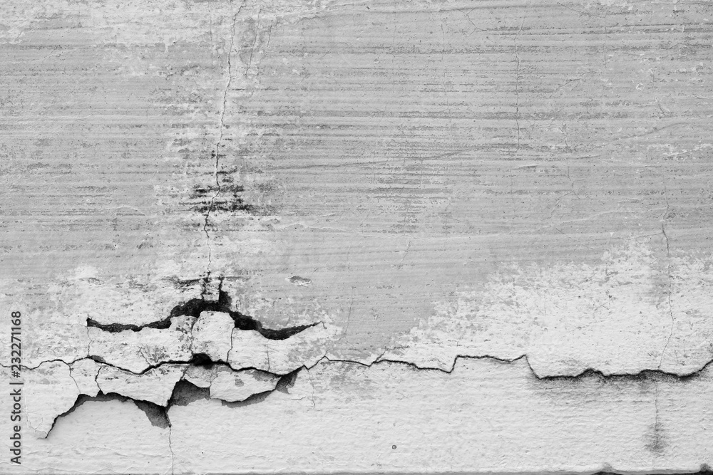 white wall with cracks