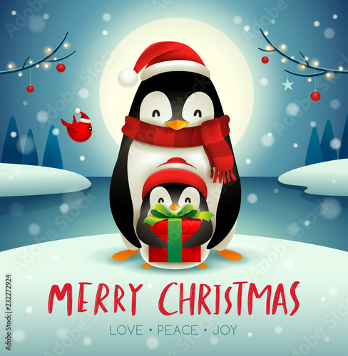 Adult penguin and baby penguin under the moonlight in Christmas snow scene.