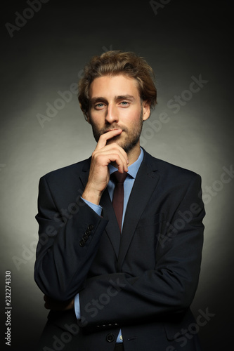 Thoughtful young businessma...