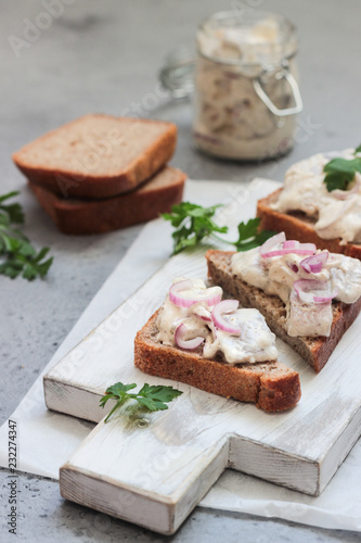 Herring sandwiches with red onion, apple, mustard and parsley.