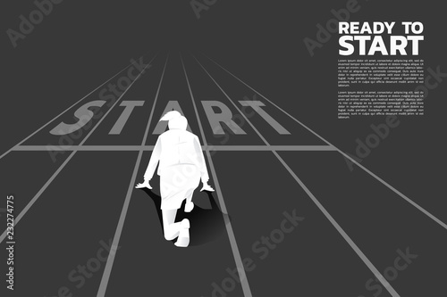 Silhouette of businesswoman ready to run from start line. Concept of people ready to start career and business