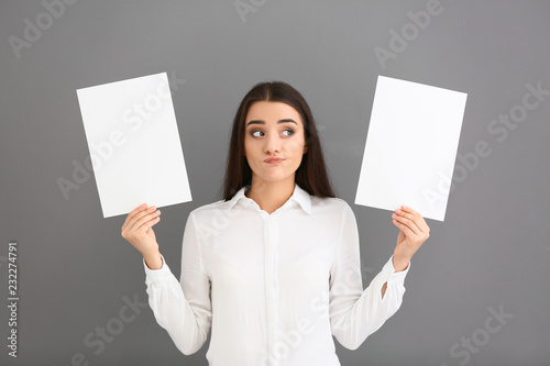 Emotional young woman with ...
