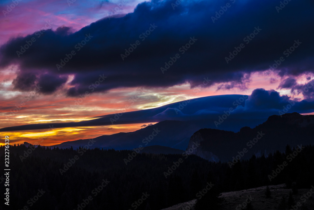 Majestic sunset over mountains.