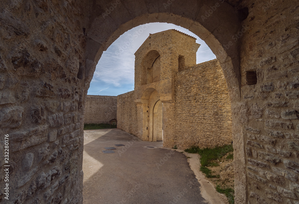 Arch and entrance to old medieval fortress (Rocca Albornoziana) in Spoleto, Umbria, Italy