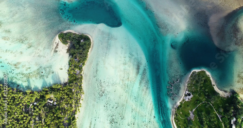 island of a lagoon in aerial view  French Polynesia