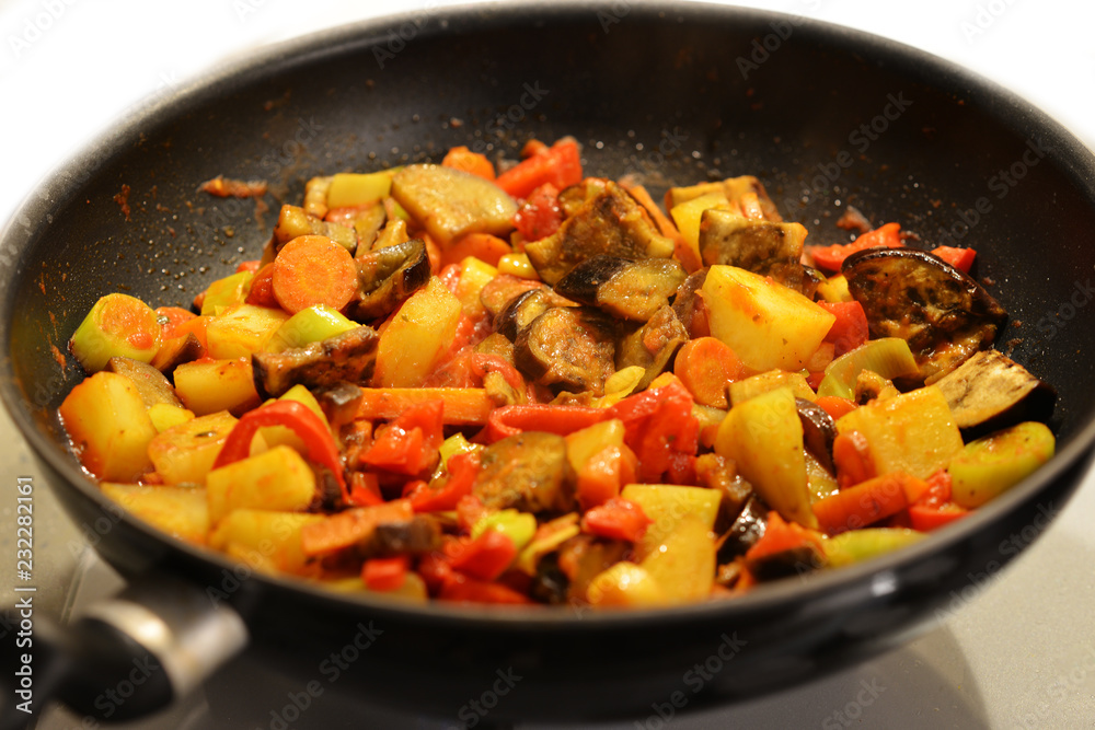 Vegetable stew in a pan, tasty and healthy cooking at home Vegetable stew in a pan, tasty and healthy cooking at home