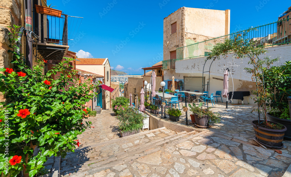 Historic village of Castellammare del Golfo with terrace, bar and restaurant in Sicily, Italy