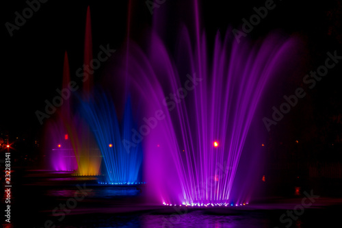 Glowing multicolored illumination fountains in the Far Eastern city of Khabarovsk. © Aleksei