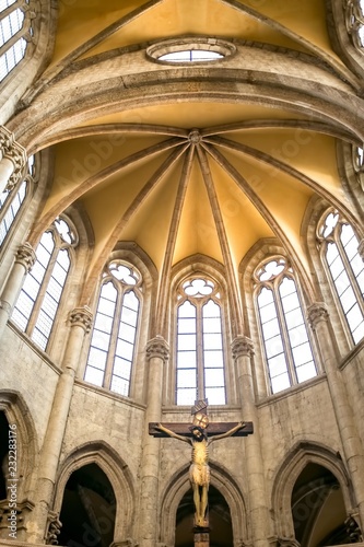 The apse with arches in Gothic style of the San Lorenzo Maggiore cathedral inside the old historic center of the city.