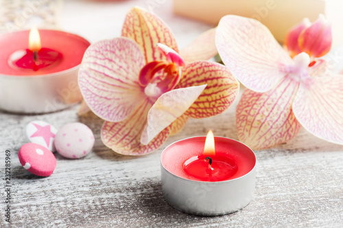 Orchids  craft gift box and lit candles