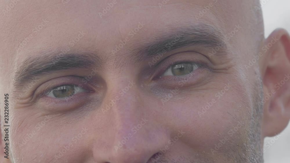 Cropped view of smiling businessman looking at camera. Emotion concept Cropped view of smiling businessman looking at camera. Emotion concept