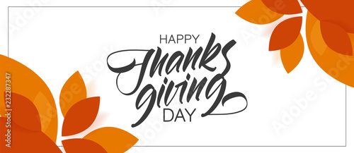 Autumn greeting banner with hand lettering composition of Happy Thanksgiving Day and fall leaves on white background