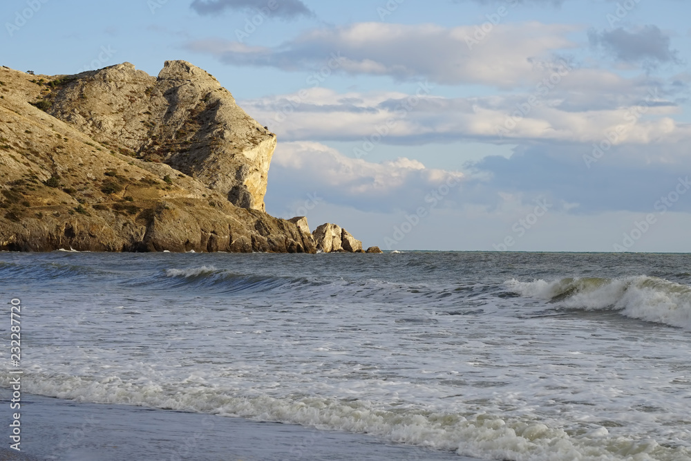 Marine landscape with a beautiful emerald waves. Sudak, Crimea.