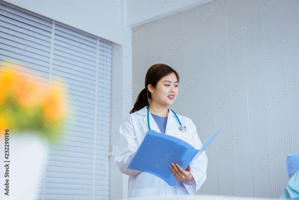 Beautiful asian doctor woman working auscultate or patient examination at hospital Beautiful asian doctor woman working auscultate or patient examination at hospital