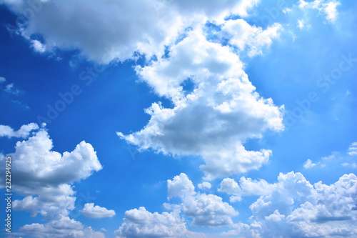 Beautiful blue sky with clouds background. Bright clouds in the blue sky