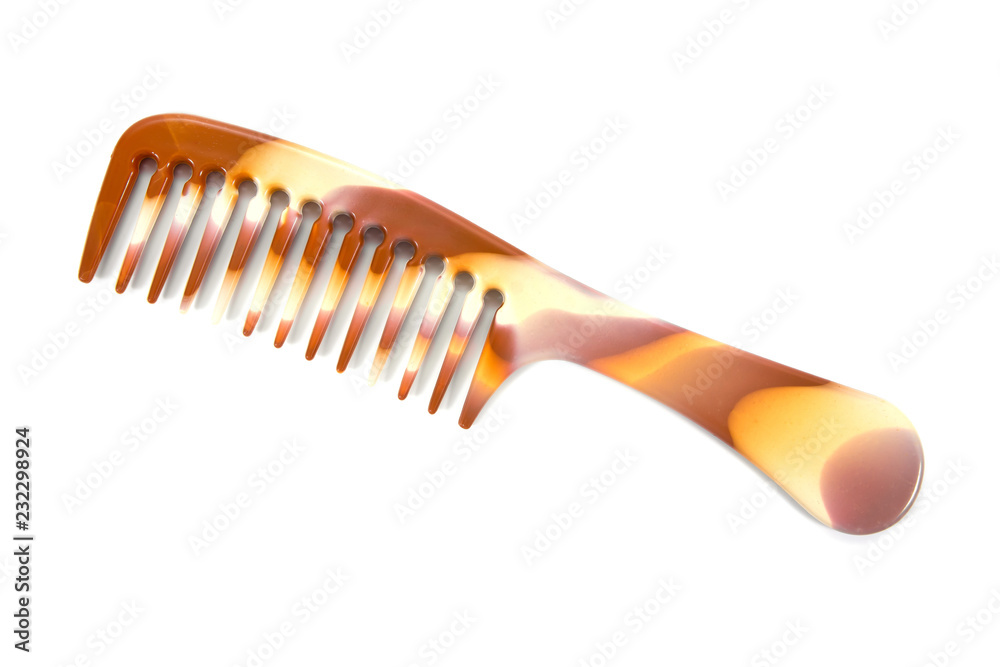 Large hair comb with handle isolated on white background. Large hair comb with handle isolated on white background.