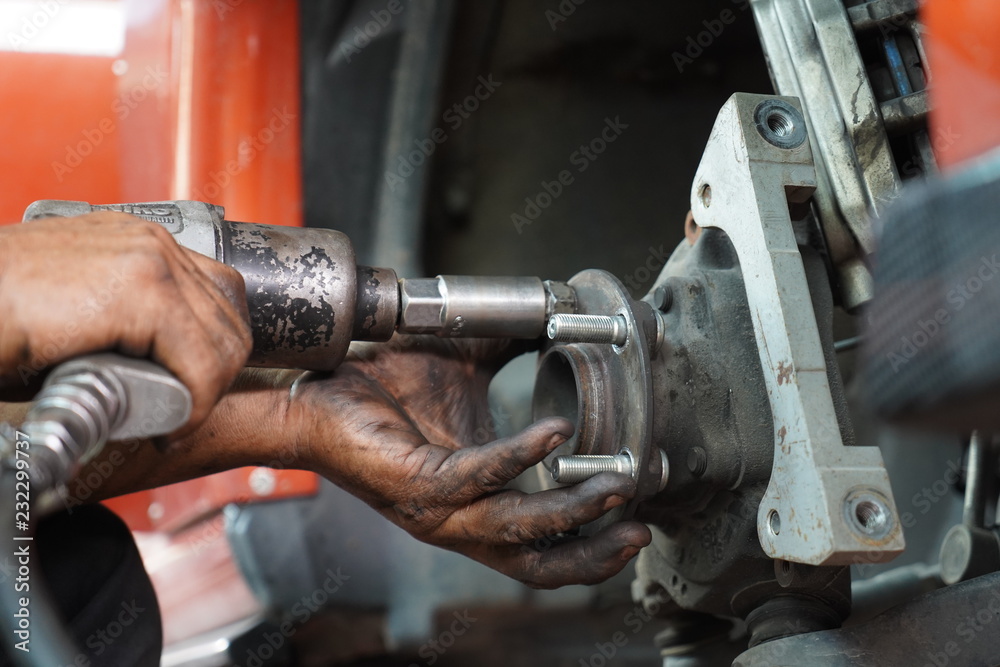 Hand fixing car's brake system Hand fixing car's brake system