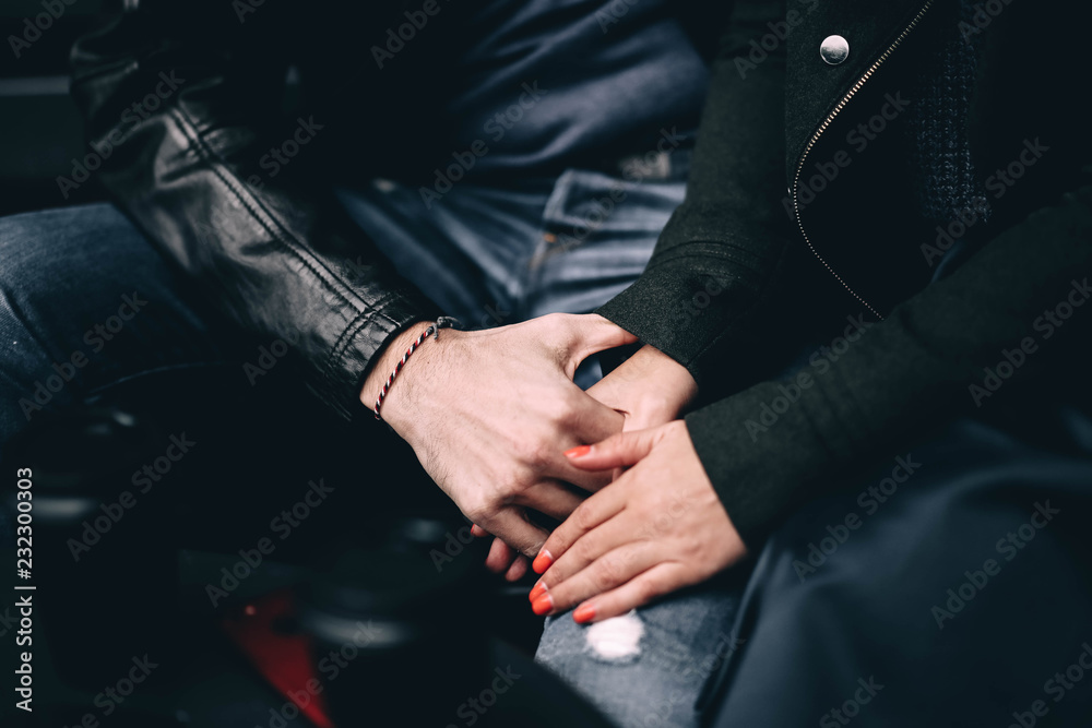 loving couple holding hands. The concept of trusting relationships, psychological support and understanding. loving couple holding hands. The concept of trusting relationships, psychological support and understanding.
