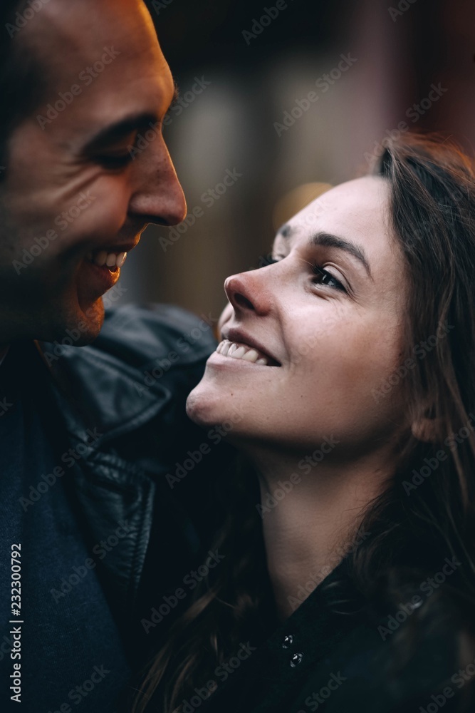 Beautiful loving couple in the evening city. Romantic relationship . Beautiful loving couple in the evening city. Romantic relationship .