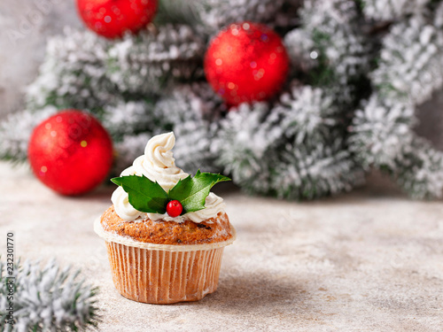 Christmas festive cupcake with holly leaves