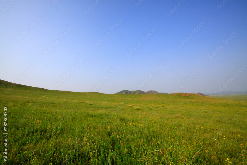 blue sky and white clouds in the WuLanBuTong grassland, China