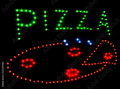 Written Pizza with leds and black background photo