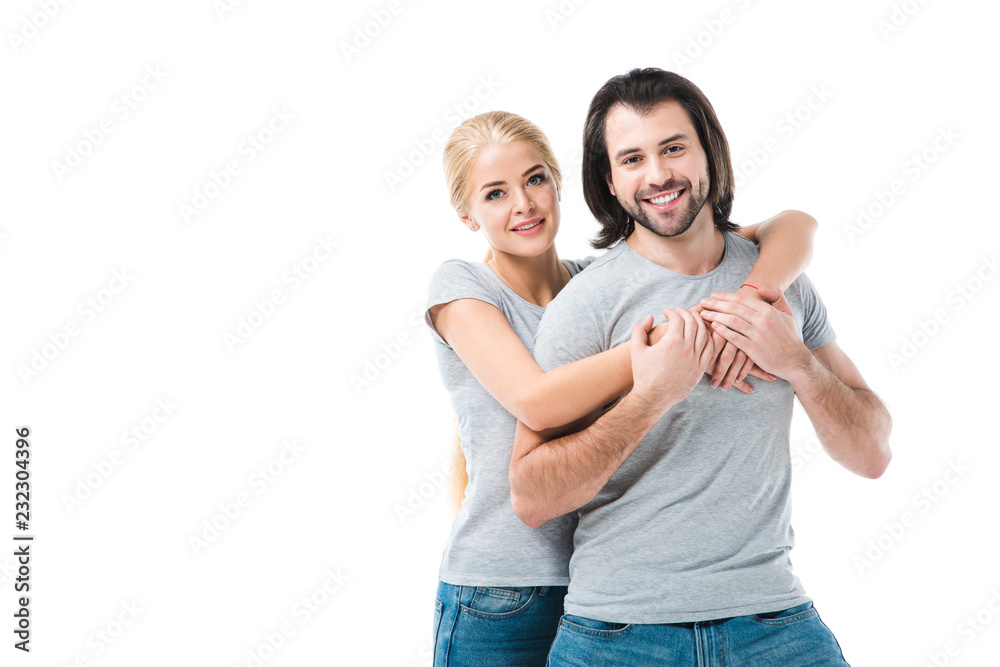 Awesome adult couple hugging and smiling isolated on white Awesome adult couple hugging and smiling isolated on white