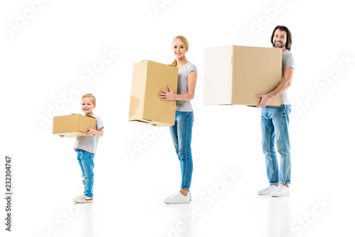 happy family holding boxes of different size isolated on white