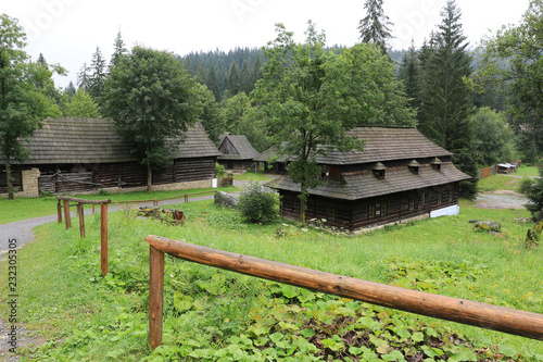 Traditional Slovakian wooden houses on old street photo