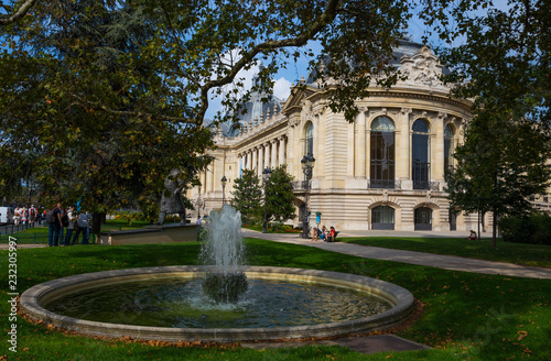 PARIS, FRANCE, SEPTEMBER 5, 2018 - A glimpse of Petit Palais (Big Palace) from the gardens with the fountain in Paris, France