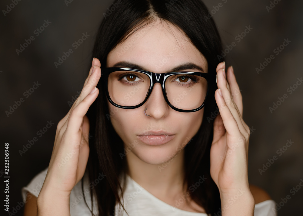 Portrait of woman wearing glasses. Selective focus. Portrait of woman wearing glasses. Selective focus.