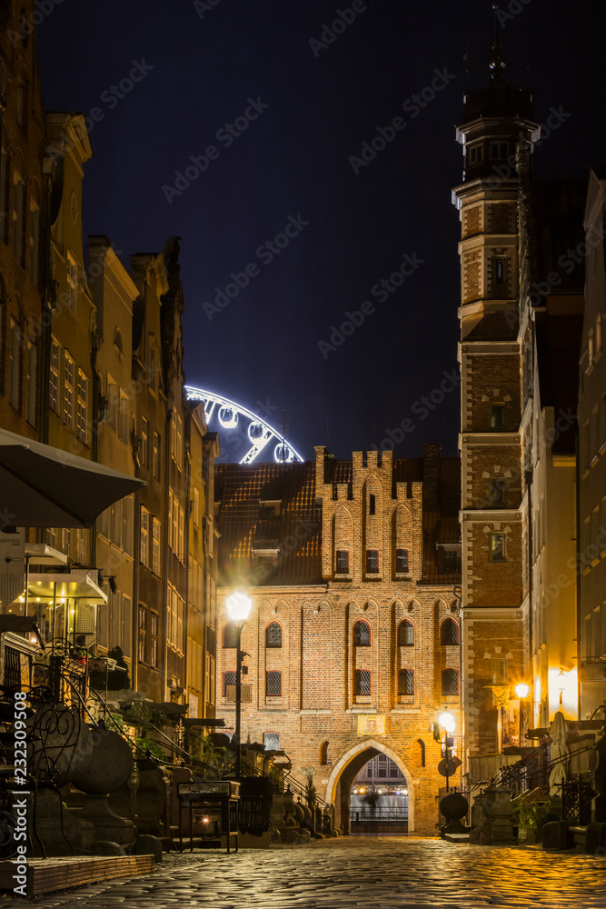 Narrow historic street in the Old Town of Gdansk at night. Poland