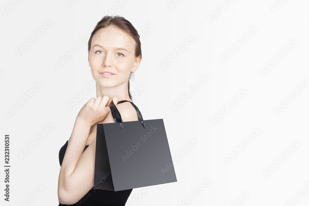 Black Friday Sales Concept with Young Woman and White Black Bags Black Friday Sales Concept with Young Woman and White Black Bags