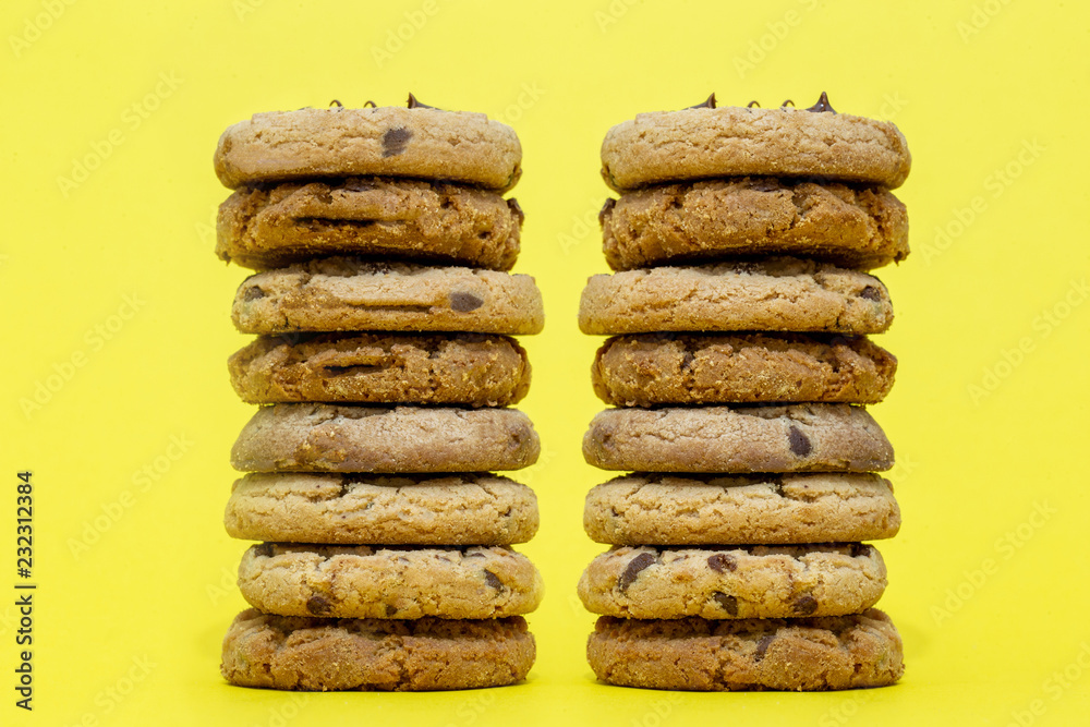 Delicious chocolate biscuits, American biscuits, with yellow background. Delicious chocolate biscuits, American biscuits, with yellow background.