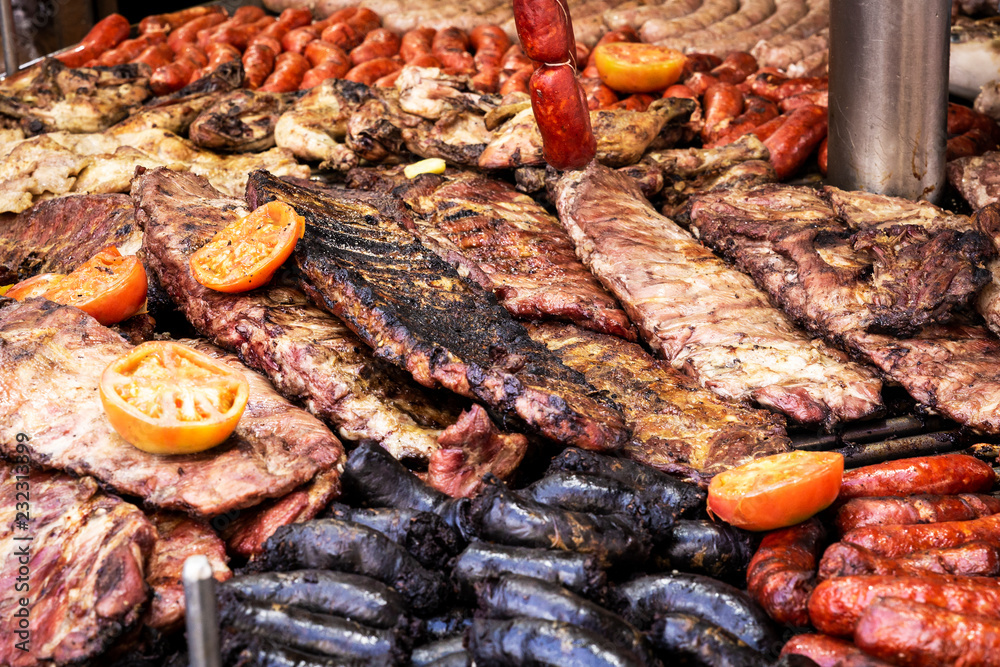 outdoor barbeque with sausages, sausages and peppers pork ribs
