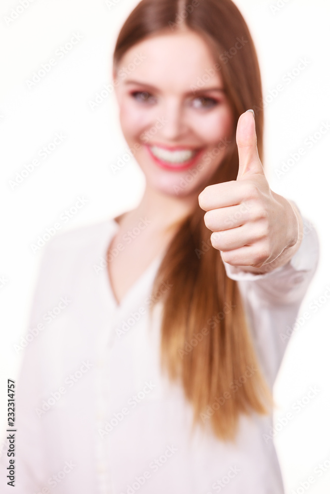 Happy positive brunette woman showing thumb up Happy positive brunette woman showing thumb up