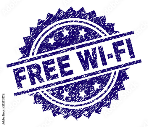 FREE WI-FI stamp seal watermark with distress style. Blue vector rubber print of FREE WI-FI text with scratched texture.